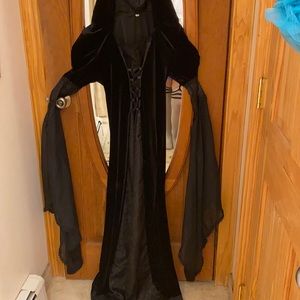 It’s a beautiful long gothic black dress.